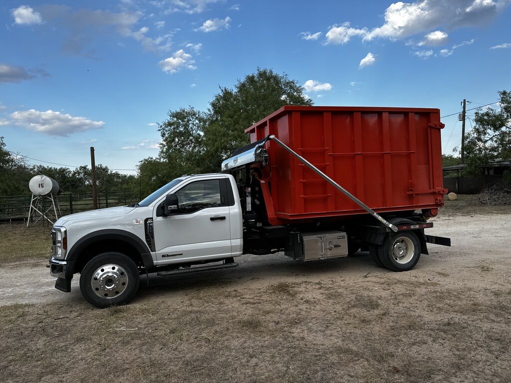 Roll-off dumpster delivery to a rural ranch job site in South Texas
